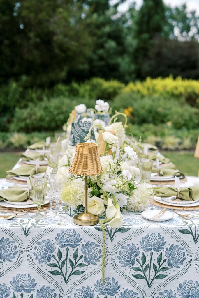 The French House wedding tablescape with lamps hanging aramanthus