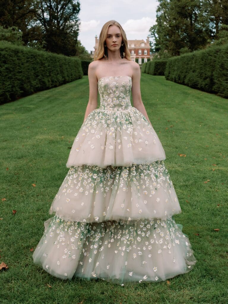strapless, three-tiered ballgown with  floral appliques and a detachable skirt 
