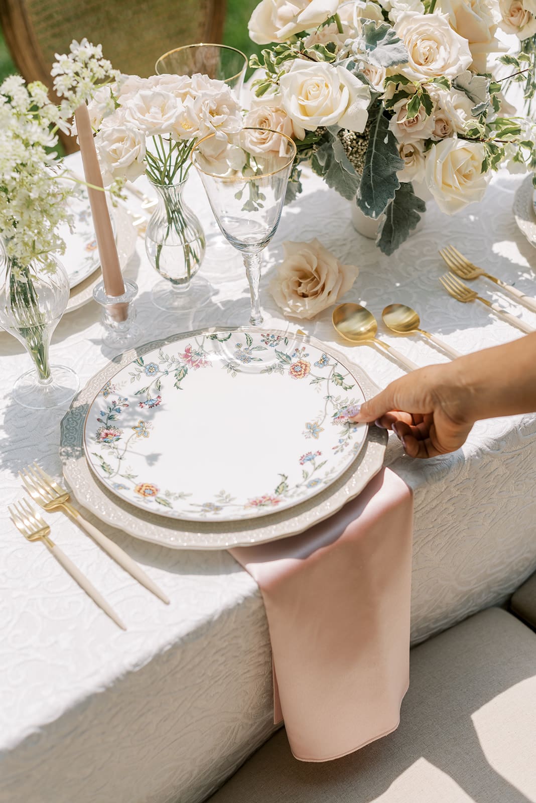 Wedding planner setting plate at garden estate wedding