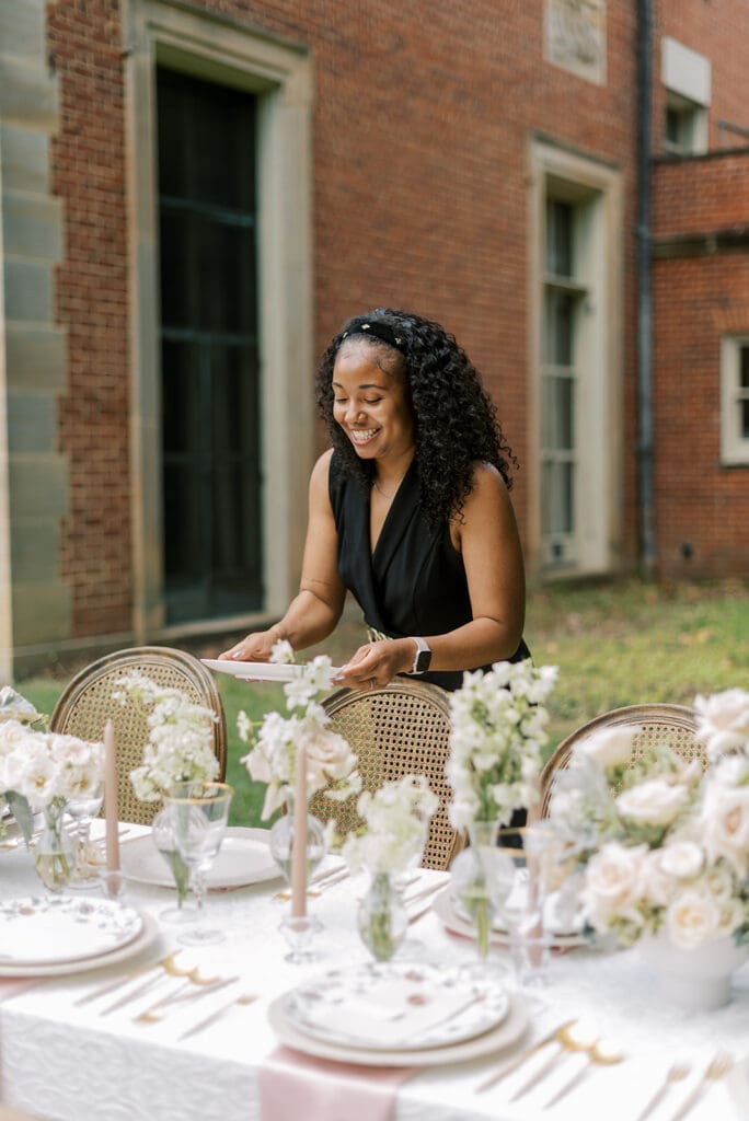 Wedding planner setting table at Peterloon Estate
